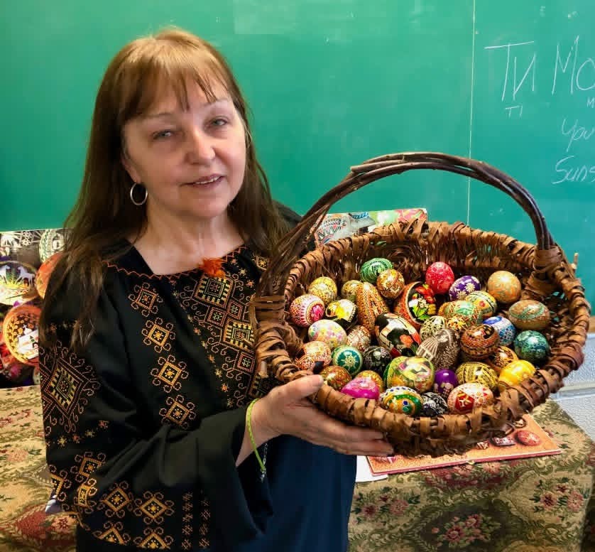 Pysanky egg artist with decorated eggs